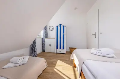 Ein Bett oder Betten in einem Zimmer der Unterkunft Haus Kranichwiese