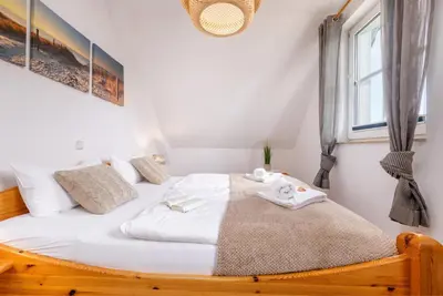Ein Bett oder Betten in einem Zimmer der Unterkunft Haus Kranichwiese