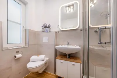 Ein Badezimmer in der Unterkunft Haus Kranichwiese