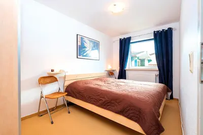 Ein Bett oder Betten in einem Zimmer der Unterkunft Fewo Seeadler