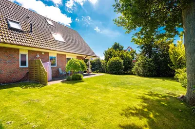 Ein Garten an der Unterkunft Fewo Möwe