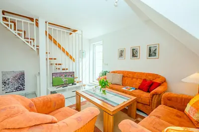 Ein Sitzbereich in der Unterkunft Haus Seeschwalbe Fewo Nr 7