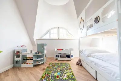 Ein Bett oder Betten in einem Zimmer der Unterkunft Ferienhaus Haubenlerche 53