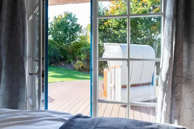 Ein Bett oder Betten in einem Zimmer der Unterkunft Ferienhaus Haubenlerche 53