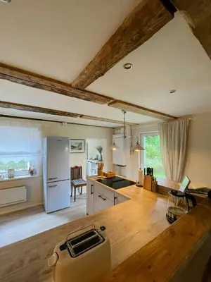 Küche/Küchenzeile in der Unterkunft Cozy Holiday Haven Near Fischland-Darß-Zingst