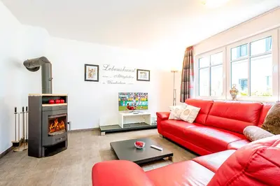 Ein Sitzbereich in der Unterkunft Ferienhaus Nani