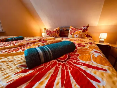 Ein Bett oder Betten in einem Zimmer der Unterkunft Karina II