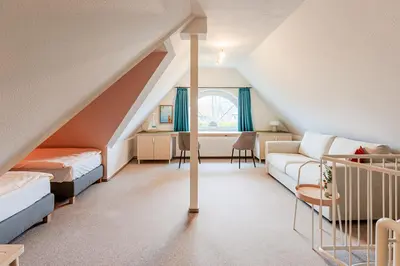 Ein Bett oder Betten in einem Zimmer der Unterkunft Haus Kormoran, Fewo Nr 3