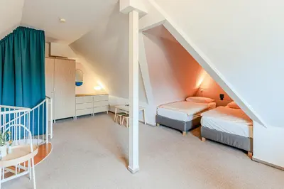 Ein Bett oder Betten in einem Zimmer der Unterkunft Haus Kormoran, Fewo Nr 3