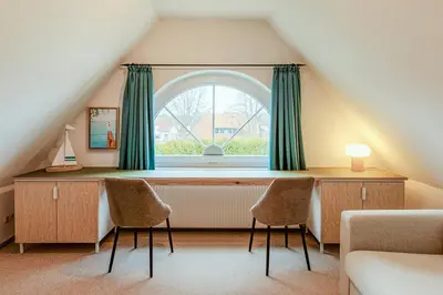 Ein Sitzbereich in der Unterkunft Haus Kormoran, Fewo Nr 3