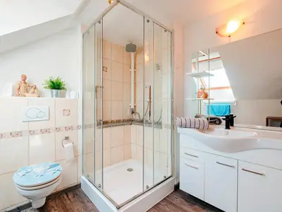Ein Badezimmer in der Unterkunft Ferienwohnung Palm