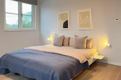 Ein Bett oder Betten in einem Zimmer der Unterkunft Ferienhäuser Baltic Lagoon Haus 16 