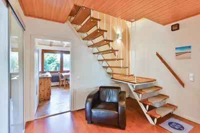 Ein Sitzbereich in der Unterkunft Ferienhaus Heideweg