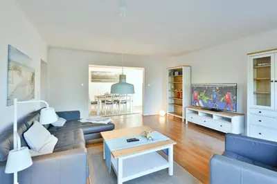 Ein Sitzbereich in der Unterkunft Ferienhaus Heideweg