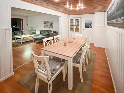 Ein Sitzbereich in der Unterkunft Ferienhaus Heideweg