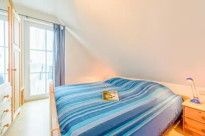 Ein Bett oder Betten in einem Zimmer der Unterkunft Fewo am Waldrand, obere Whg