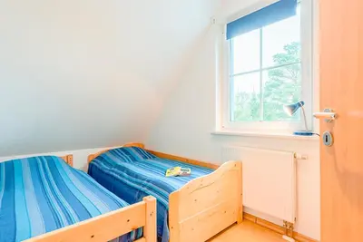 Ein Bett oder Betten in einem Zimmer der Unterkunft Fewo am Waldrand, obere Whg