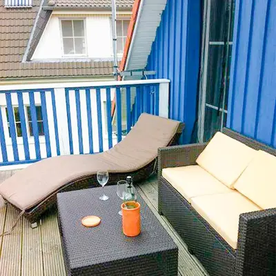 Ein Sitzbereich in der Unterkunft Fewo am Waldrand, obere Whg