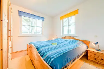 Ein Bett oder Betten in einem Zimmer der Unterkunft Fewo am Waldrand, untere Whg