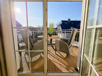 Ein Balkon oder eine Terrasse in der Unterkunft Sehnsuchtsort Zingst - strandnahe Ferienwohnung, Hund willkommen