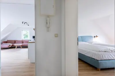 Ein Bett oder Betten in einem Zimmer der Unterkunft Boddenräuber 4