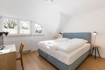 Ein Bett oder Betten in einem Zimmer der Unterkunft Boddenräuber 5