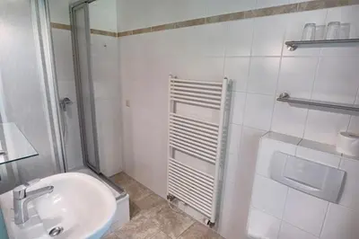 Ein Badezimmer in der Unterkunft Haus Sonnenwinkel, FeWo 3