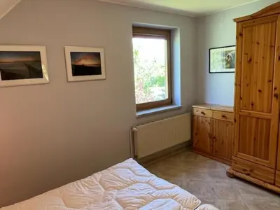 Ein Bett oder Betten in einem Zimmer der Unterkunft Haus Sonnenwinkel, FeWo 2