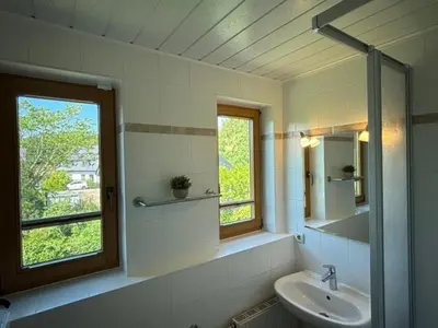 Ein Badezimmer in der Unterkunft Haus Sonnenwinkel, FeWo 1