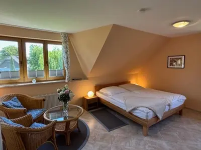 Ein Bett oder Betten in einem Zimmer der Unterkunft Haus Sonnenwinkel, FeWo 1