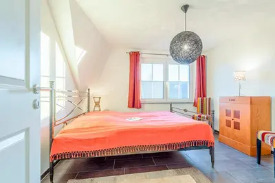 Ein Bett oder Betten in einem Zimmer der Unterkunft Ferienhaus Meeresrauschen
