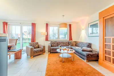 Ein Sitzbereich in der Unterkunft Ferienhaus Meeresrauschen