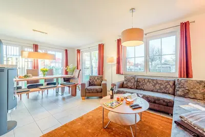 Ein Sitzbereich in der Unterkunft Ferienhaus Meeresrauschen