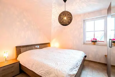 Ein Bett oder Betten in einem Zimmer der Unterkunft Schifferhaus Whg Backbord, Nr 4