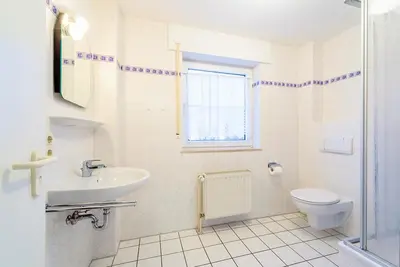 Ein Badezimmer in der Unterkunft Haus Strandperle Fewo Nr 12