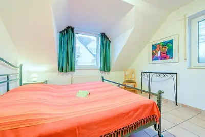 Ein Bett oder Betten in einem Zimmer der Unterkunft Haus Strandperle Fewo Nr 12