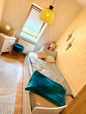Ein Bett oder Betten in einem Zimmer der Unterkunft Hafenstraße 34 MEERverliebt