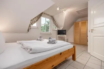 Ein Bett oder Betten in einem Zimmer der Unterkunft Reihenmittelhaus Toraya