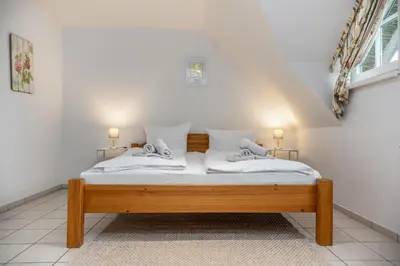 Ein Bett oder Betten in einem Zimmer der Unterkunft Reihenmittelhaus Toraya