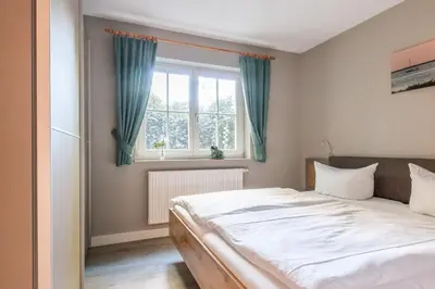 Ein Bett oder Betten in einem Zimmer der Unterkunft Jagdhaus Schwinkelsmoor