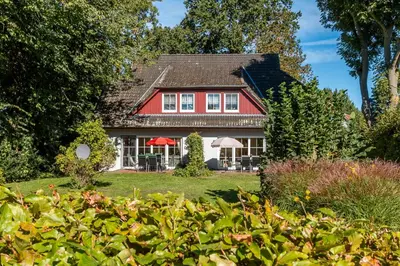 Ein Garten an der Unterkunft Jagdhaus Schwinkelsmoor