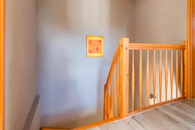 Ein Bett oder Betten in einem Zimmer der Unterkunft Jagdhaus Prerowstrom