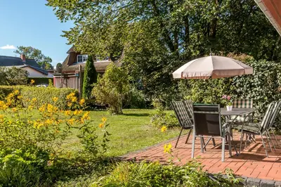 Ein Garten an der Unterkunft Jagdhaus Prerowstrom
