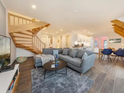 Ein Sitzbereich in der Unterkunft One-bedroom apartment