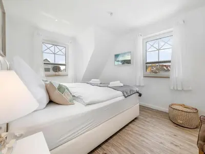 Ein Bett oder Betten in einem Zimmer der Unterkunft House Küstenkind