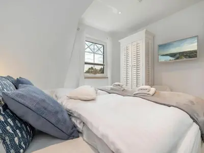 Ein Bett oder Betten in einem Zimmer der Unterkunft House Küstenkind
