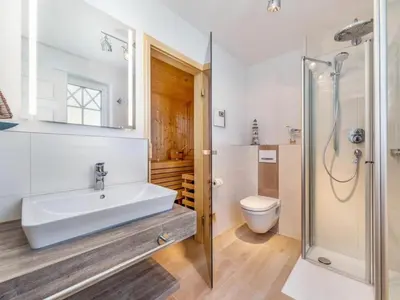 Ein Badezimmer in der Unterkunft House Küstenkind