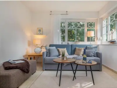 Ein Sitzbereich in der Unterkunft One-bedroom apartment