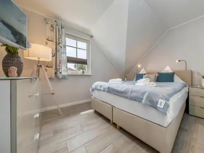 Ein Bett oder Betten in einem Zimmer der Unterkunft Holiday home in Zingst with swimming pool