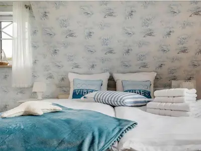 Ein Bett oder Betten in einem Zimmer der Unterkunft Holiday home in Zingst with swimming pool